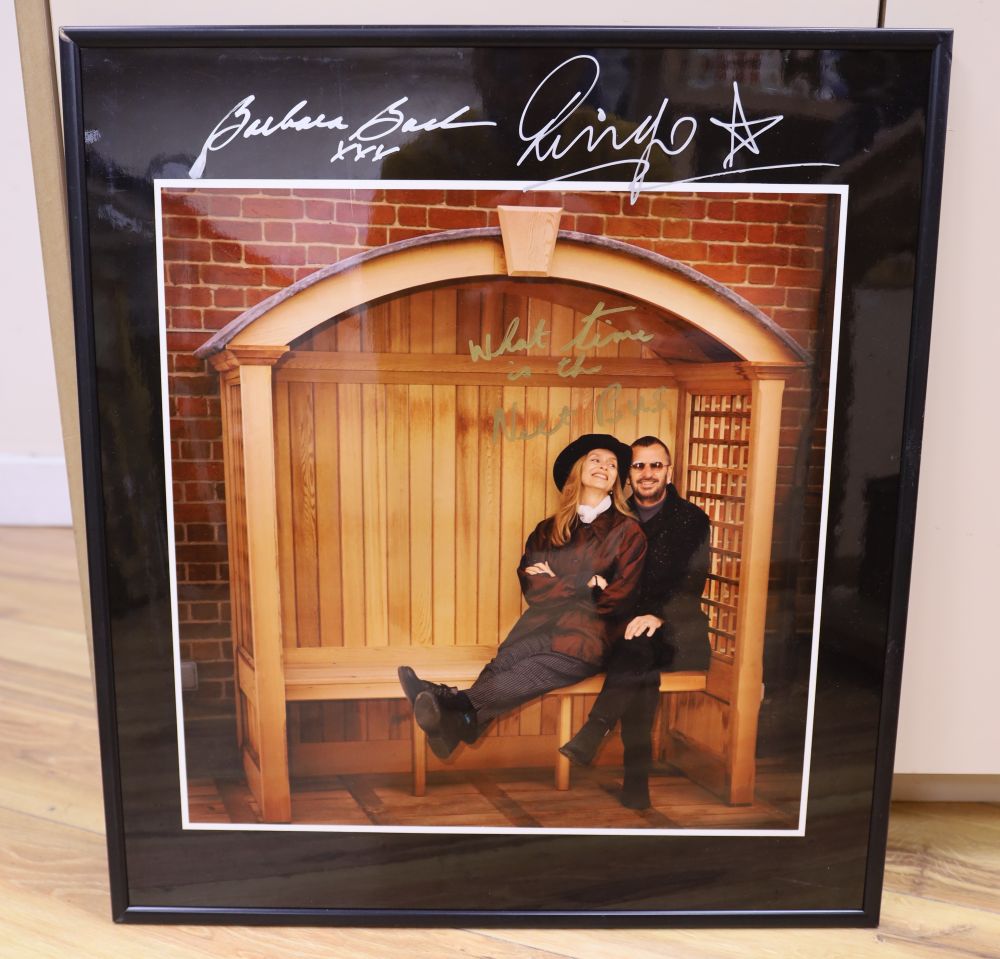 Ringo Starr and Barbara Bach, a signed photograph,  What time is the next bus?, 55 x 50cm